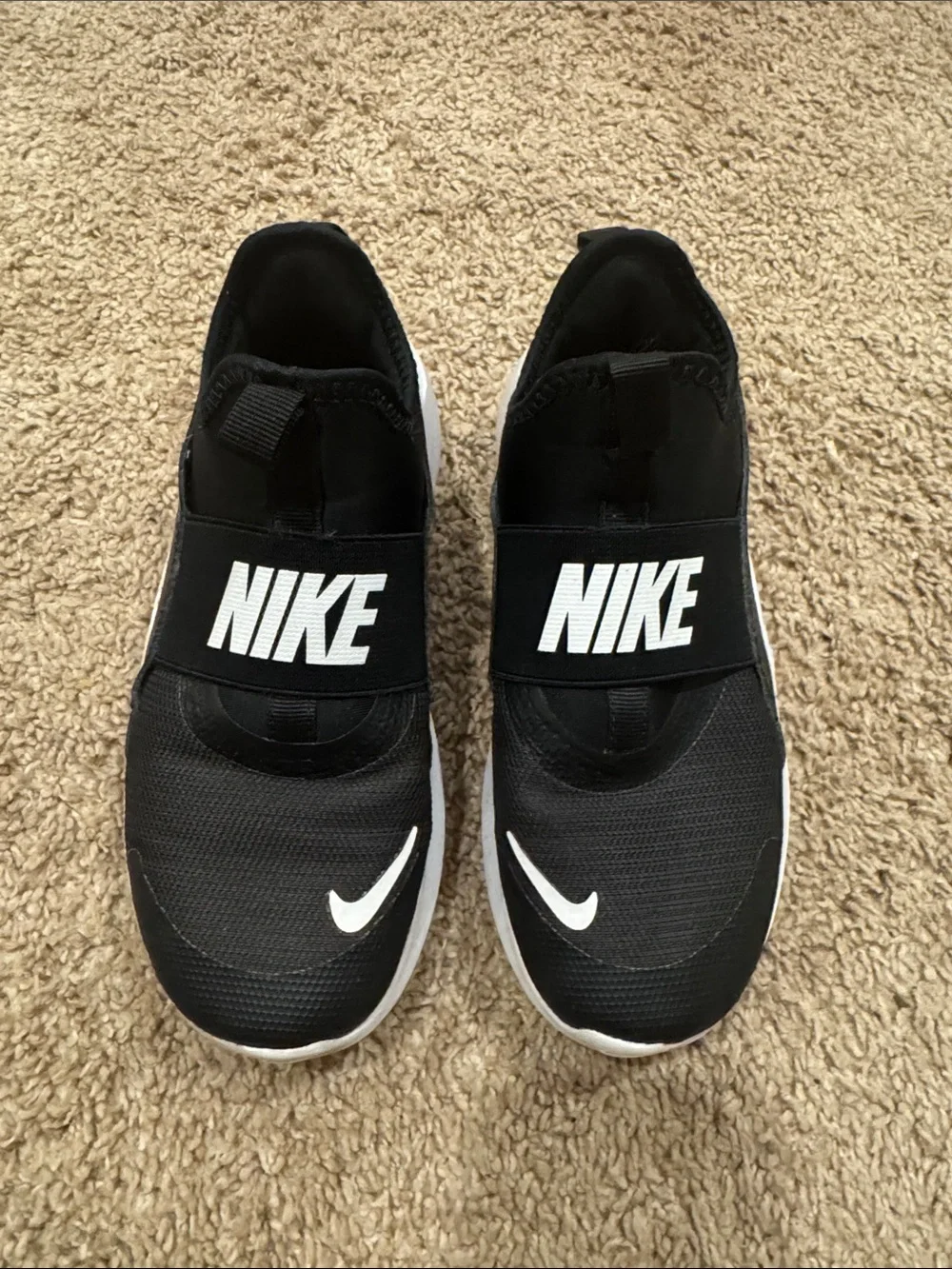 Nike Kids Black and White Slip-On Sneakers